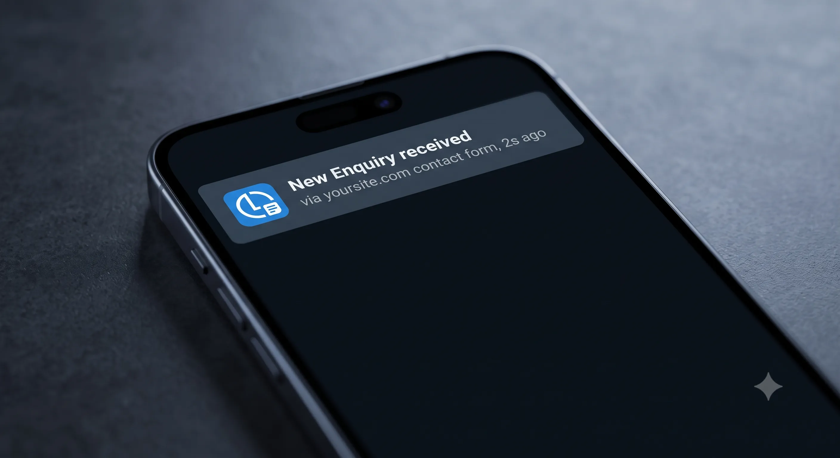 Phone showing a push notification: New Enquiry received, via yoursite.com contact form